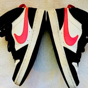 Nike Court Borough Mid 2 kids in a black, white, and sunset pulse pink colorway.